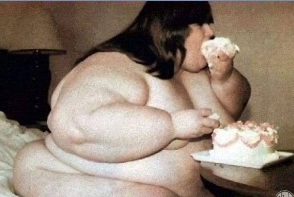 fat people eating cake. from an eating film.