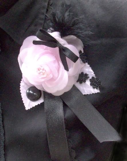 broche rosa rosada