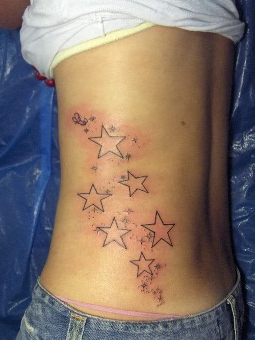 Star tattoos, although usually small, tattoo :: rib stars picture